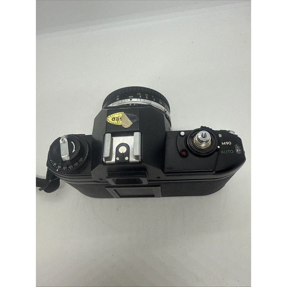 Vintage Nikon EM Black SLR Film Camera with Nikon Lens